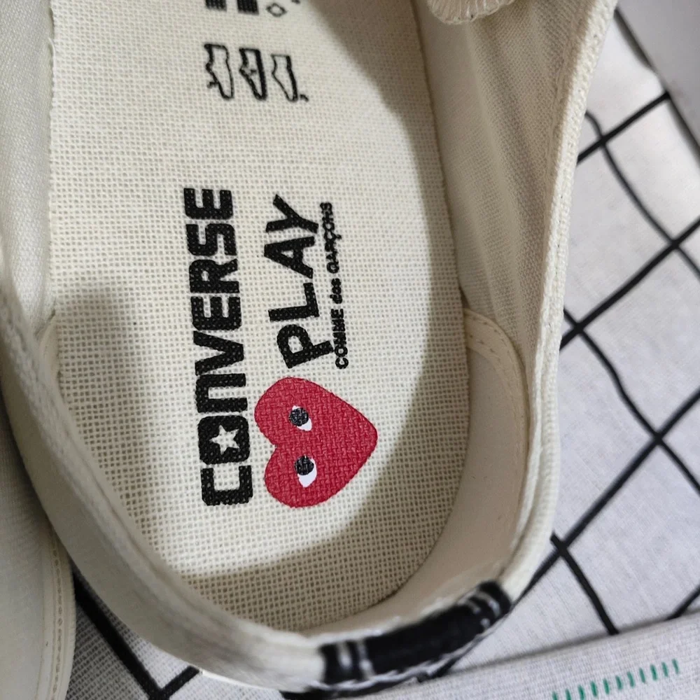 Comme des Garçons PLAY Cream Slip-On Sneakers with Red Heart Logo